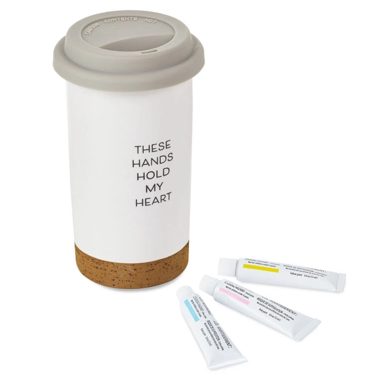 These Hands Hold My Heart Ceramic Travel Mug, 12.5 oz. Hallmark These Hands Hold My Heart Ceramic Travel Mug, 12.5 Oz. -Hallmark Store These Hands Hold My Heart Travel Mug With Paints 1BBY4852 01